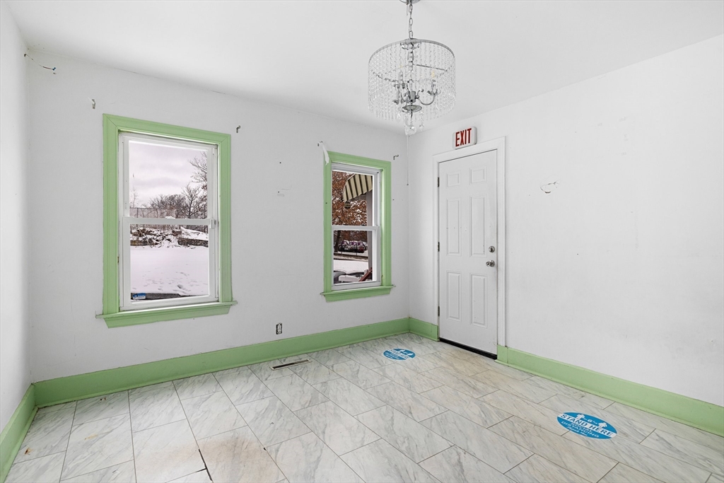 3 Ely Street Worcester, MA 01610 - Photo 8 of 17 a view of an empty room with a window