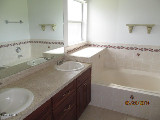 698 Sauders Road Southeast Palm Bay, FL 32909 - Photo 11 of 16 Master bathroom