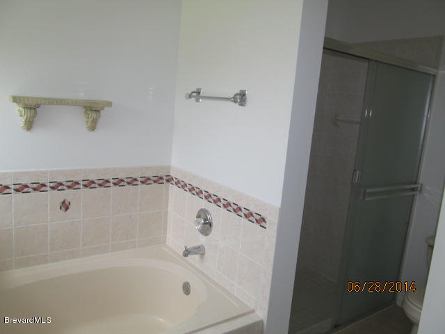 698 Sauders Road Southeast Palm Bay, FL 32909 - Photo 12 of 16 Master bathroom