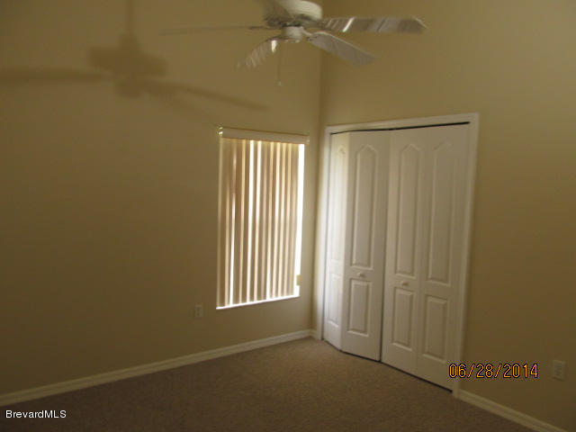 698 Sauders Road Southeast Palm Bay, FL 32909 - Photo 13 of 16 Second bedroom