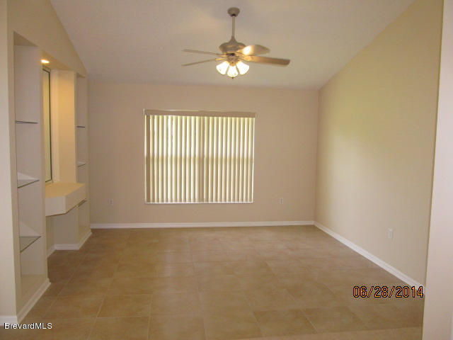 698 Sauders Road Southeast Palm Bay, FL 32909 - Photo 4 of 16 Living room