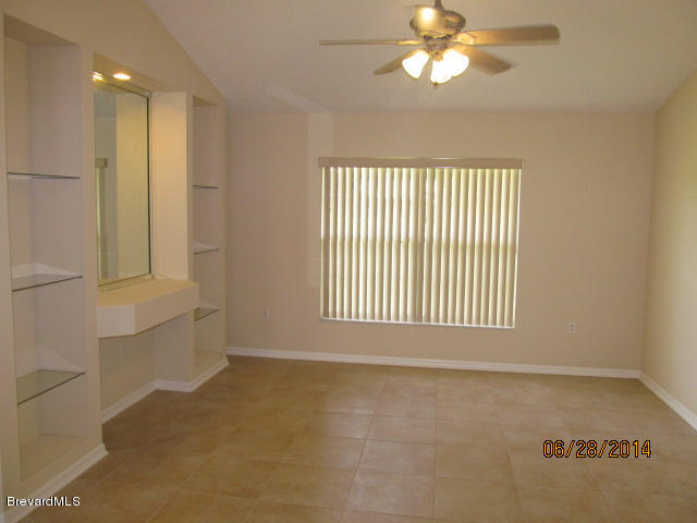 698 Sauders Road Southeast Palm Bay, FL 32909 - Photo 5 of 16 Living rooom