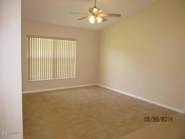 698 Sauders Road Southeast Palm Bay, FL 32909 - Photo 8 of 16 Family room