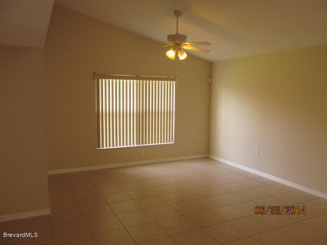 698 Sauders Road Southeast Palm Bay, FL 32909 - Photo 9 of 16 Family room