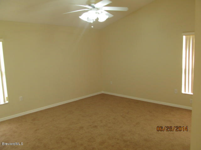 698 Sauders Road Southeast Palm Bay, FL 32909 - Photo 10 of 16 Master bedroom