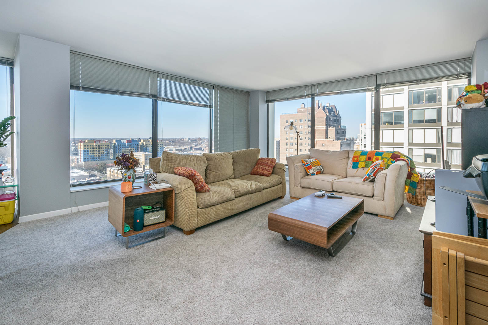 5445 North Sheridan Road, Unit 1701 Chicago, IL 60640 - Photo 2 of 11 a living room with furniture and a large window