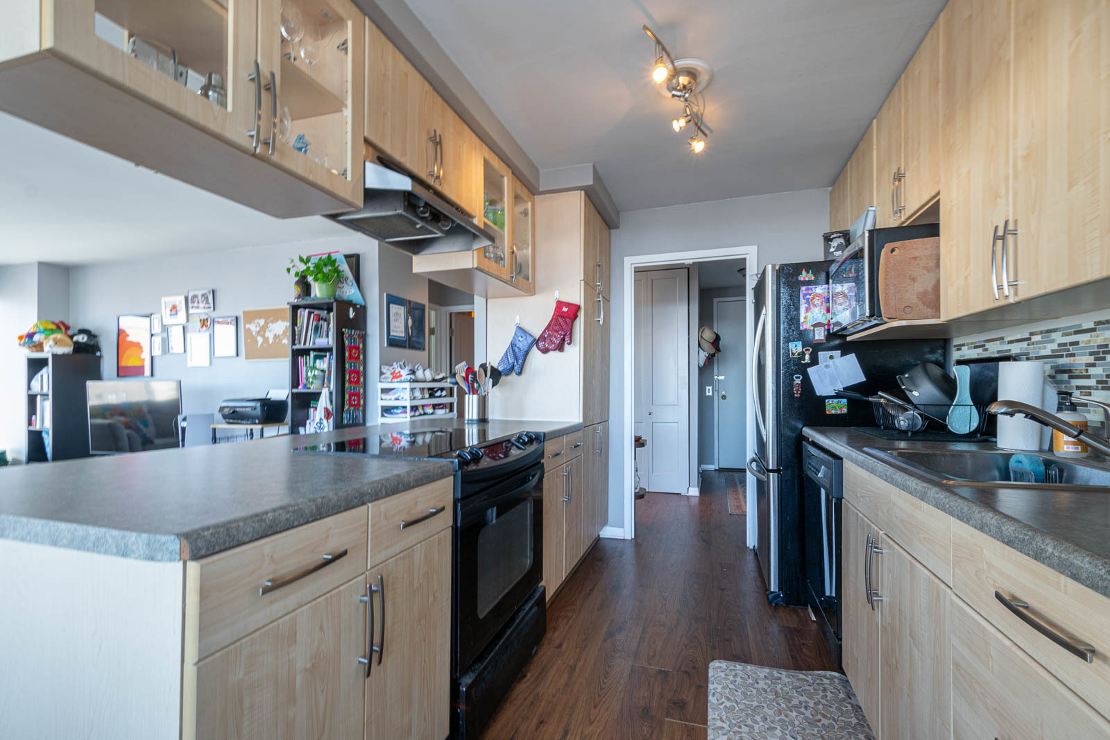 5445 North Sheridan Road, Unit 1701 Chicago, IL 60640 - Photo 5 of 11 a kitchen with stainless steel appliances granite countertop a lot of counter top space