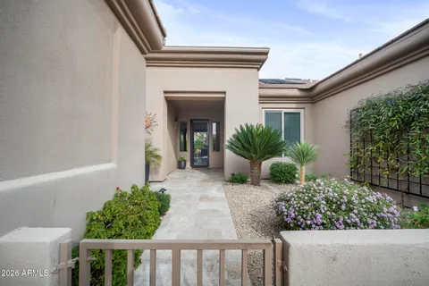 a front view of a house with yard