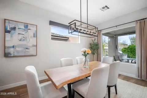 a kitchen with a sink appliances and cabinets