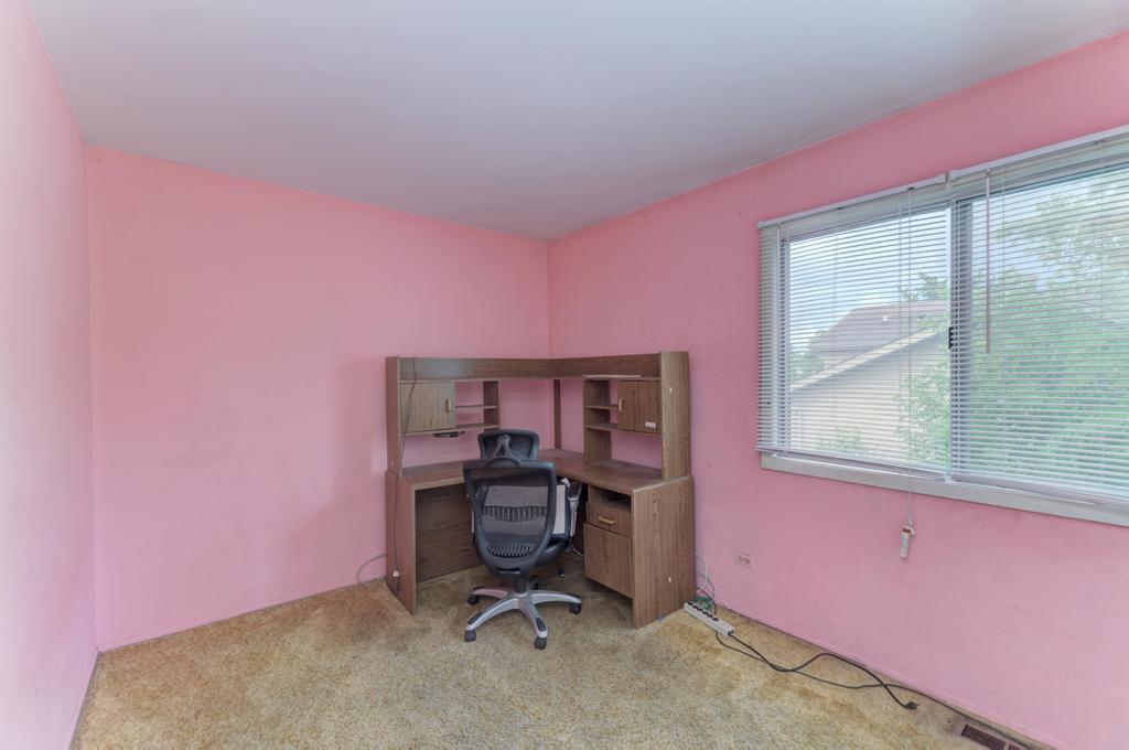 28 Willow Road Matteson, IL 60443 - Photo 23 of 30 a view of a workspace with furniture and a window