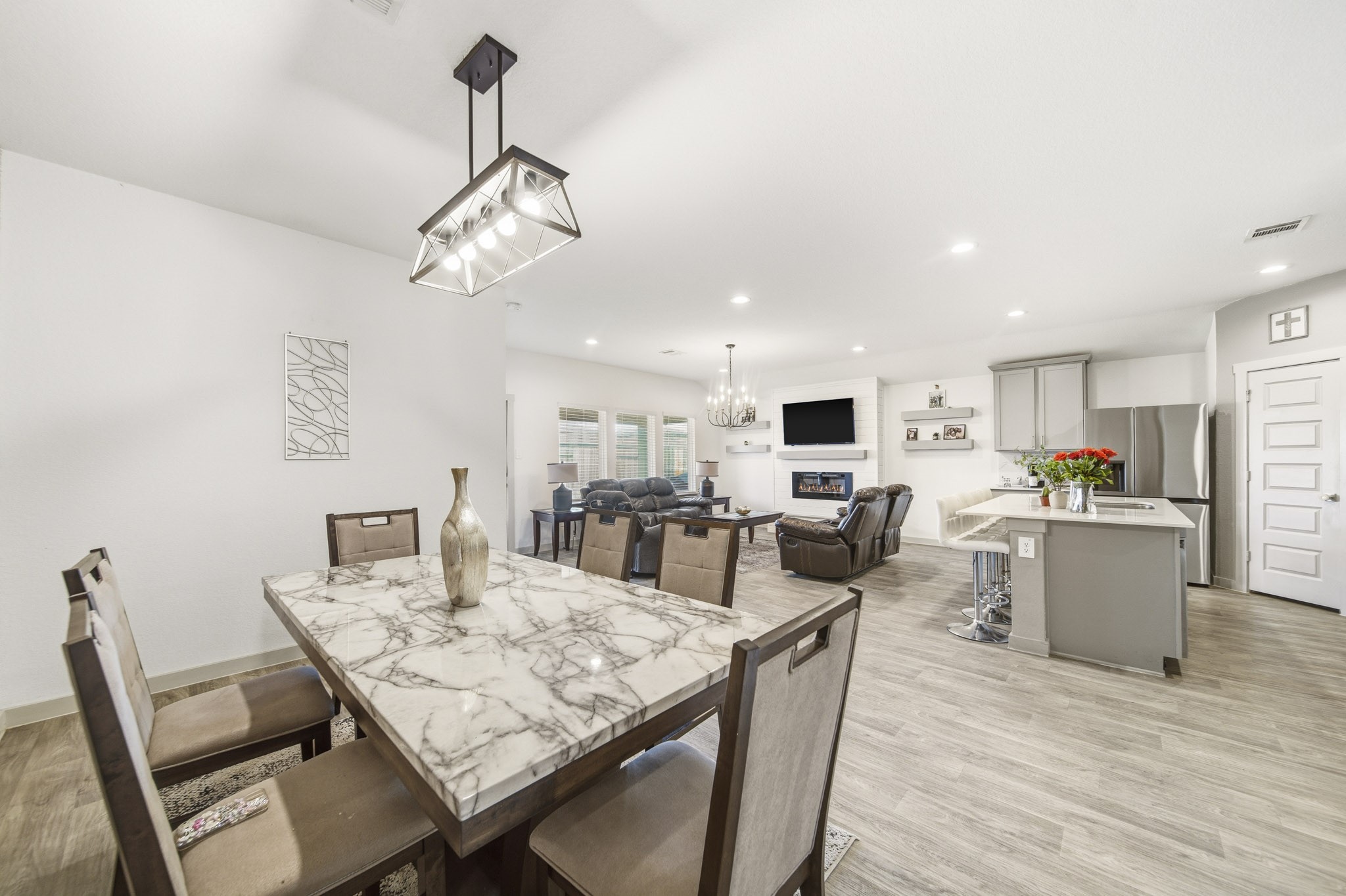 8210 Buck Lane Rosharon, TX 77583 - Photo 8 of 30 Dining area seamlessly connected to the kitchen and living space for easy entertaining.