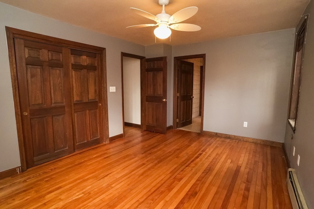 2 Perkins Lane Acushnet, MA 02743 - Photo 18 of 41 a view of an empty room with wooden floor