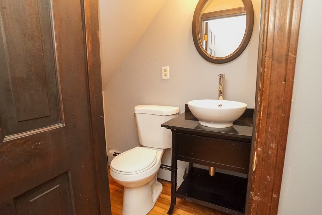 2 Perkins Lane Acushnet, MA 02743 - Photo 29 of 41 a bathroom with a toilet a sink and a mirror