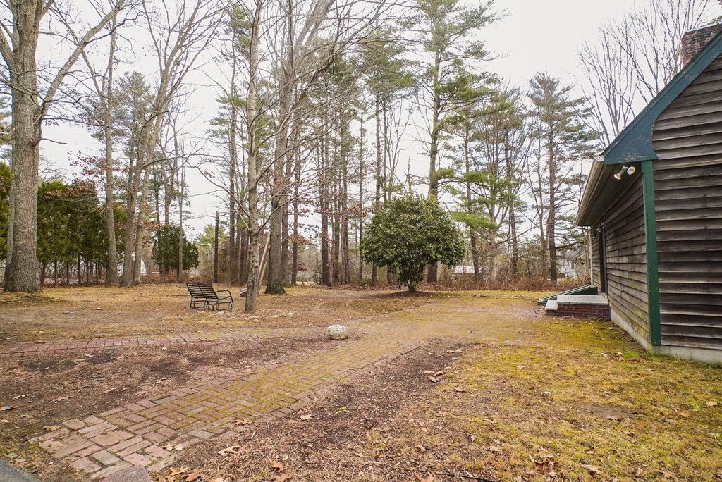 2 Perkins Lane Acushnet, MA 02743 - Photo 39 of 41 a backyard of a house with lots of trees
