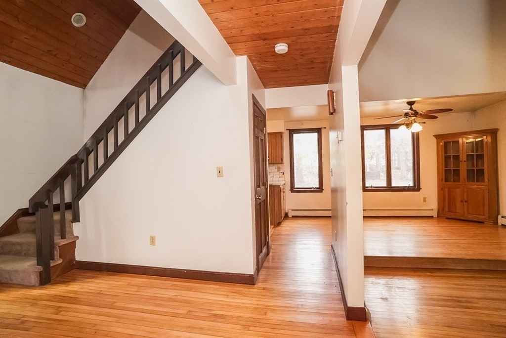 2 Perkins Lane Acushnet, MA 02743 - Photo 4 of 41 a view of an entryway with wooden floor and windows
