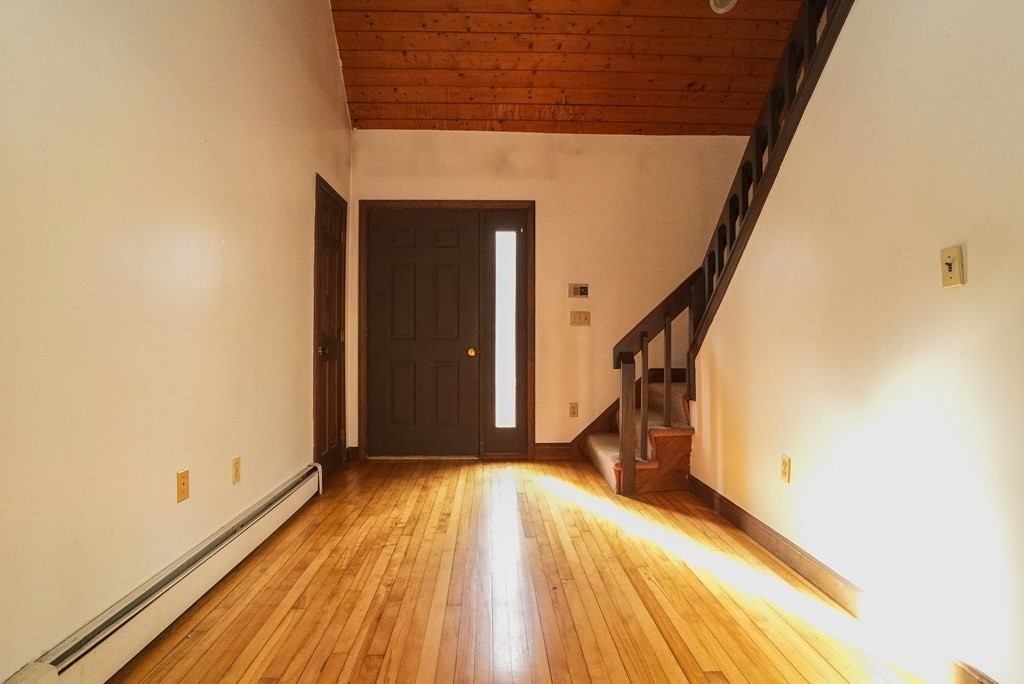 2 Perkins Lane Acushnet, MA 02743 - Photo 6 of 41 a view of empty room with wooden floor