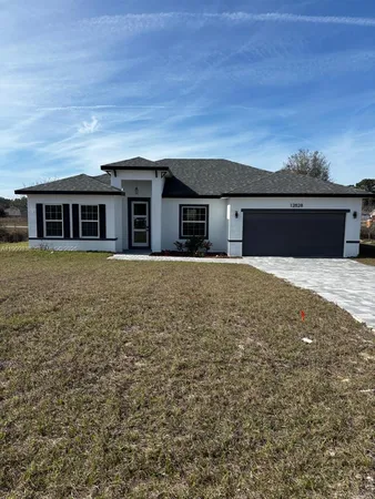 front view of house with a yard