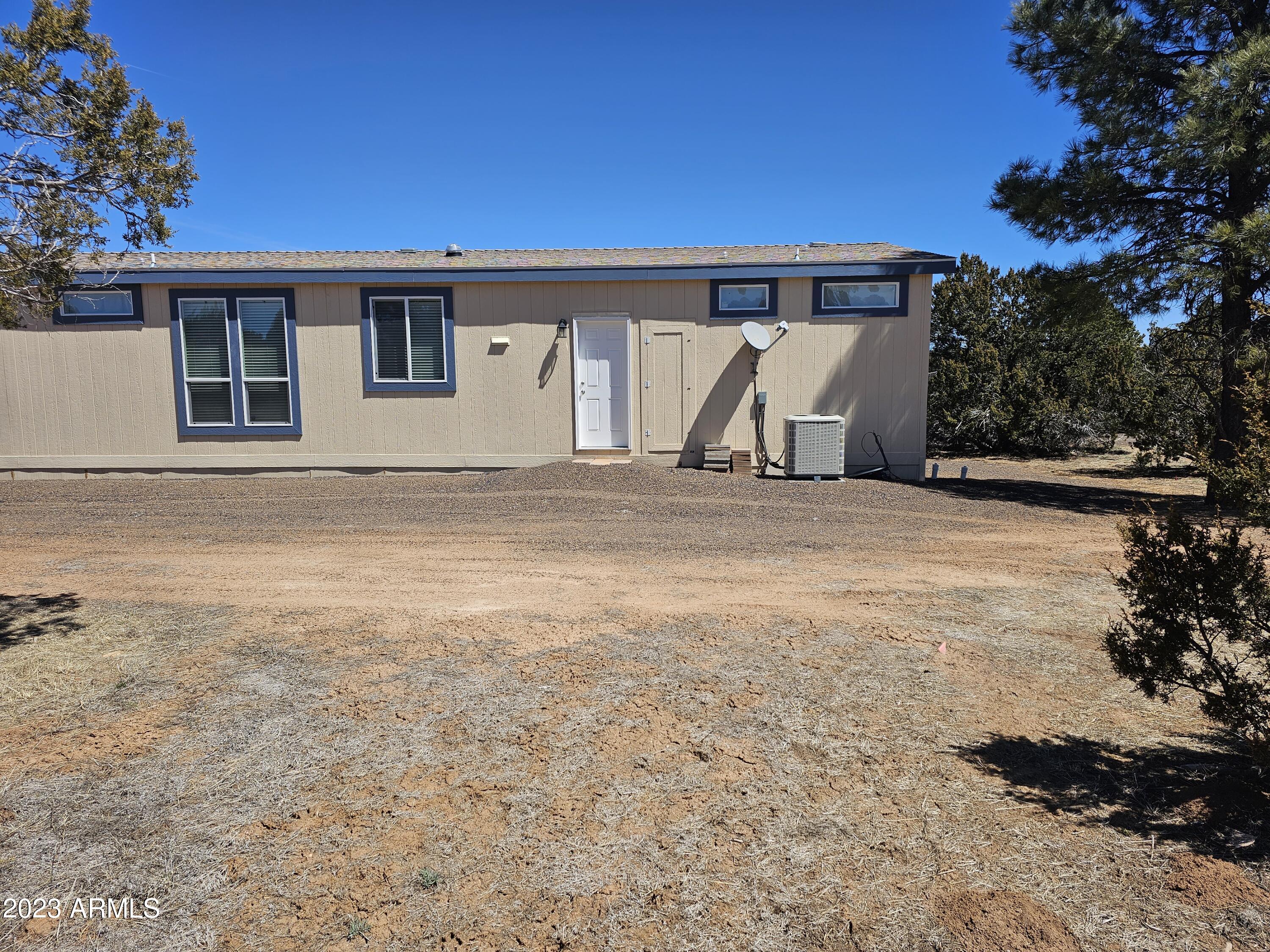 3356 Basin Road Overgaard, AZ 85933 - Photo 19 of 22 Exterior rear