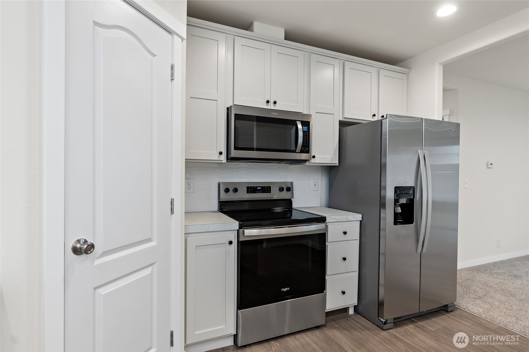 309 Sumner Street Bucoda, WA 98530 - Photo 11 of 35 a kitchen with cabinets stainless steel appliances and a counter space
