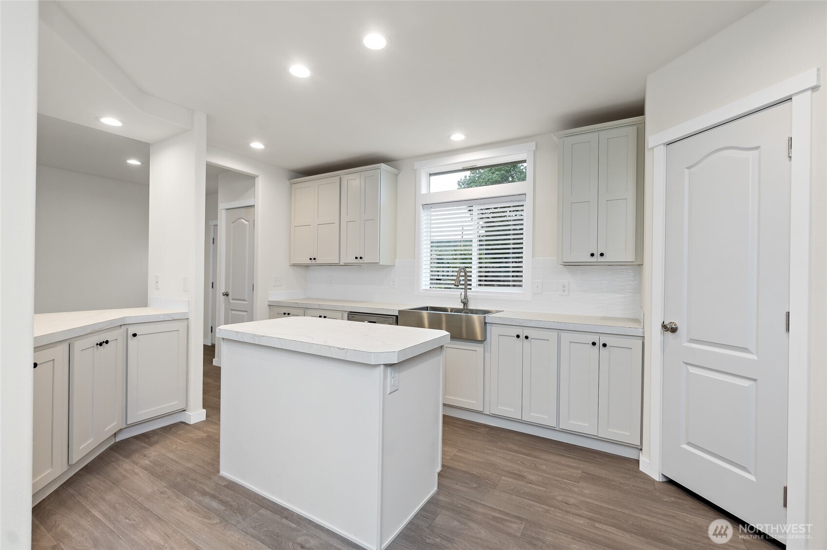 309 Sumner Street Bucoda, WA 98530 - Photo 15 of 35 a kitchen with white cabinets and sink