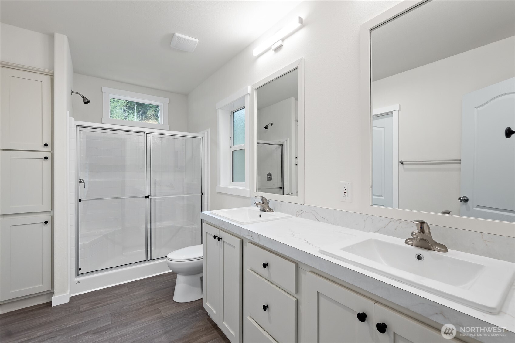 309 Sumner Street Bucoda, WA 98530 - Photo 21 of 35 a bathroom with a sink a toilet and shower