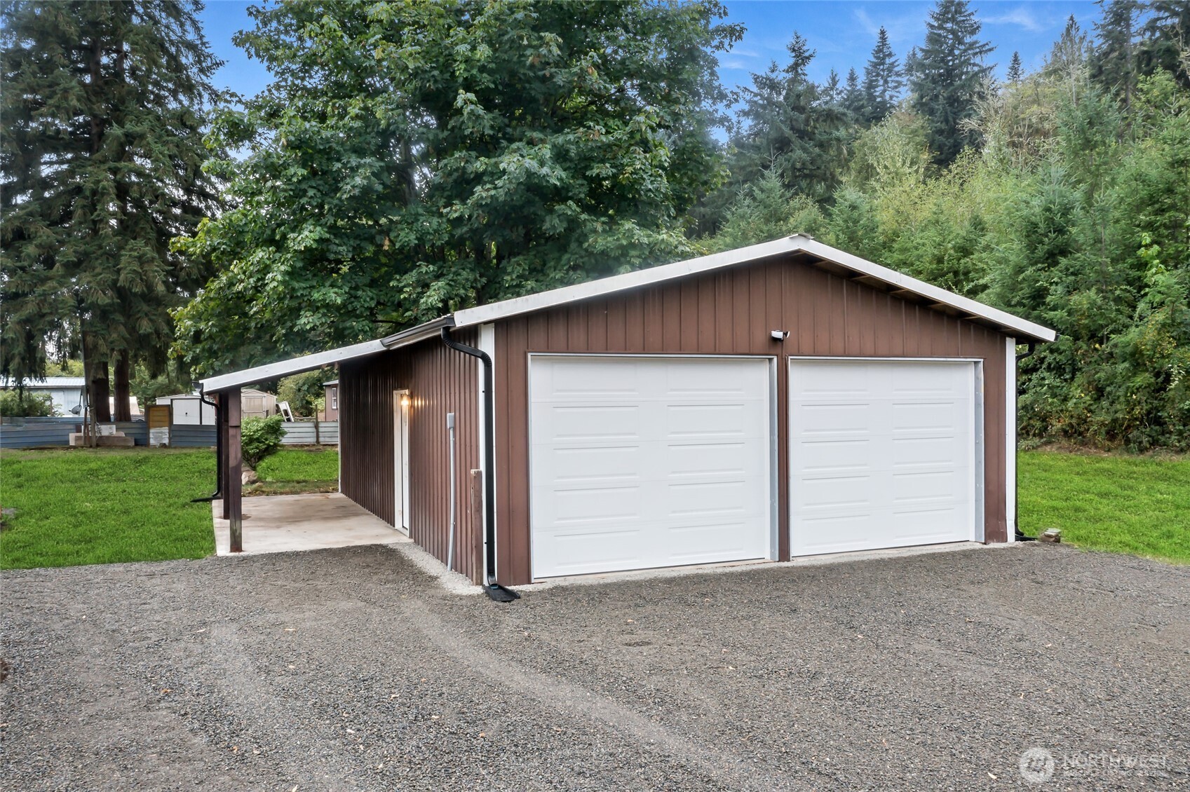 309 Sumner Street Bucoda, WA 98530 - Photo 29 of 35 a view of a house with a yard and garage