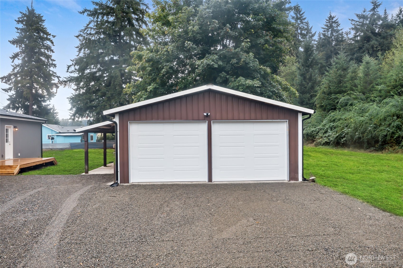 309 Sumner Street Bucoda, WA 98530 - Photo 33 of 35 a view of a house with a yard and garage