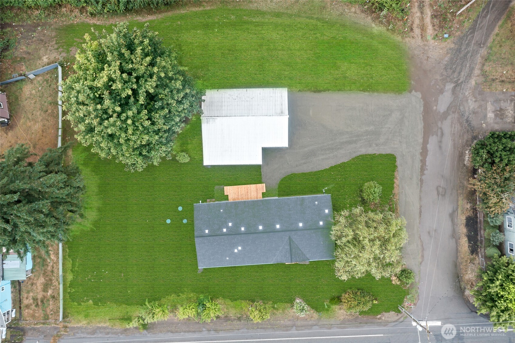 309 Sumner Street Bucoda, WA 98530 - Photo 34 of 35 an aerial view of a house with a yard