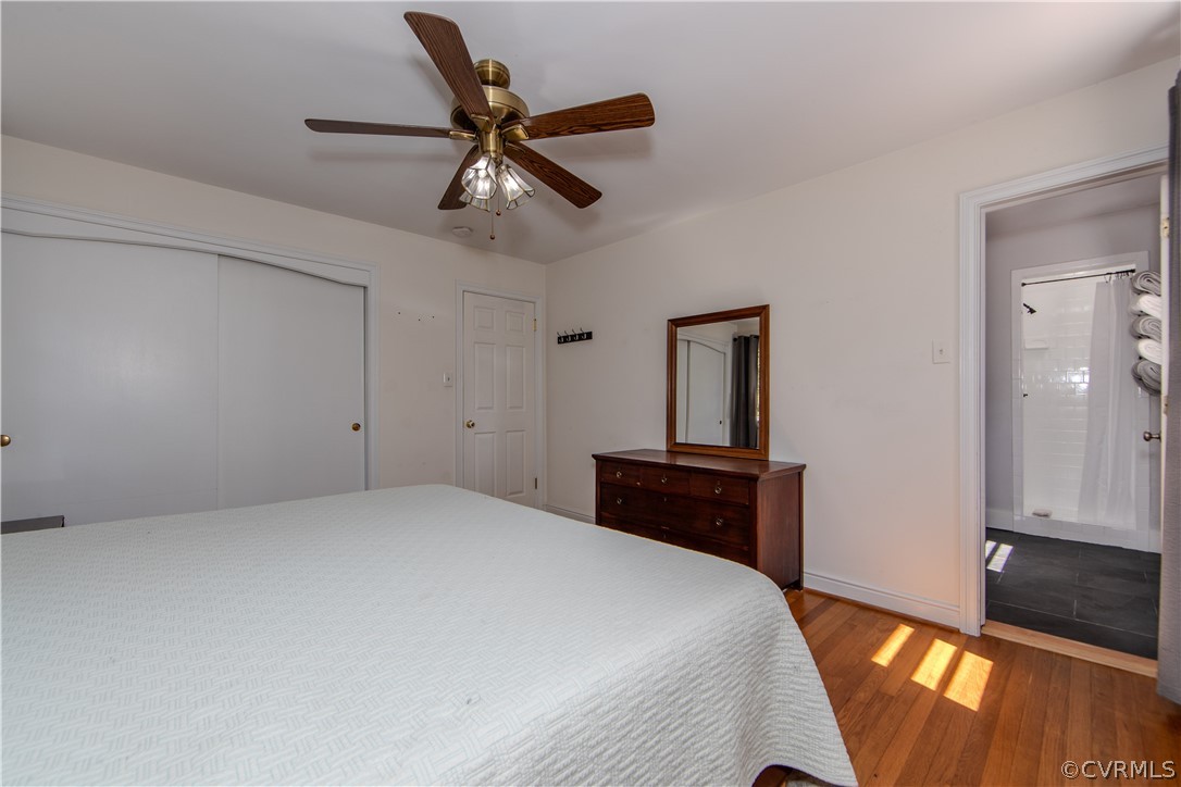 7706 Comanche Drive Richmond, VA 23225 - Photo 14 of 42 a bedroom with a bed and a dresser