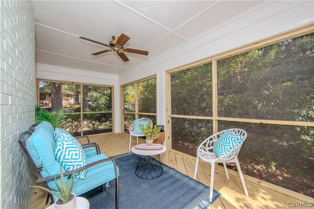 7706 Comanche Drive Richmond, VA 23225 - Photo 28 of 42 a living room with furniture and a window