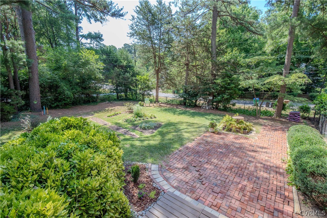 7706 Comanche Drive Richmond, VA 23225 - Photo 39 of 42 a view of a street with a tree
