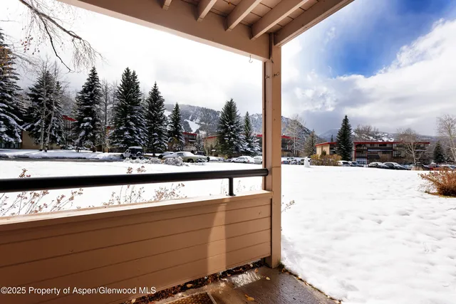 a view of swimming pool from a balcony