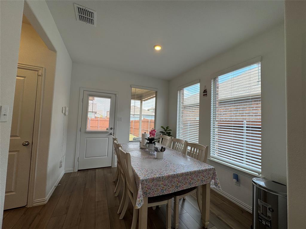 3159 Blossom Trail Crandall, TX 75114 - Photo 11 of 25 a view of a dining room with furniture and window