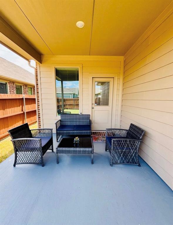 3159 Blossom Trail Crandall, TX 75114 - Photo 23 of 25 a living room with furniture and a window