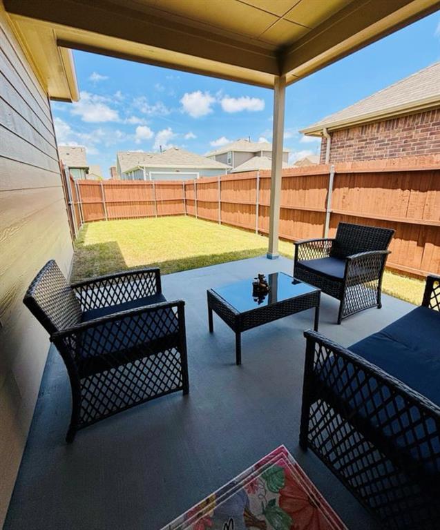 3159 Blossom Trail Crandall, TX 75114 - Photo 24 of 25 a view of a chairs and table in the patio