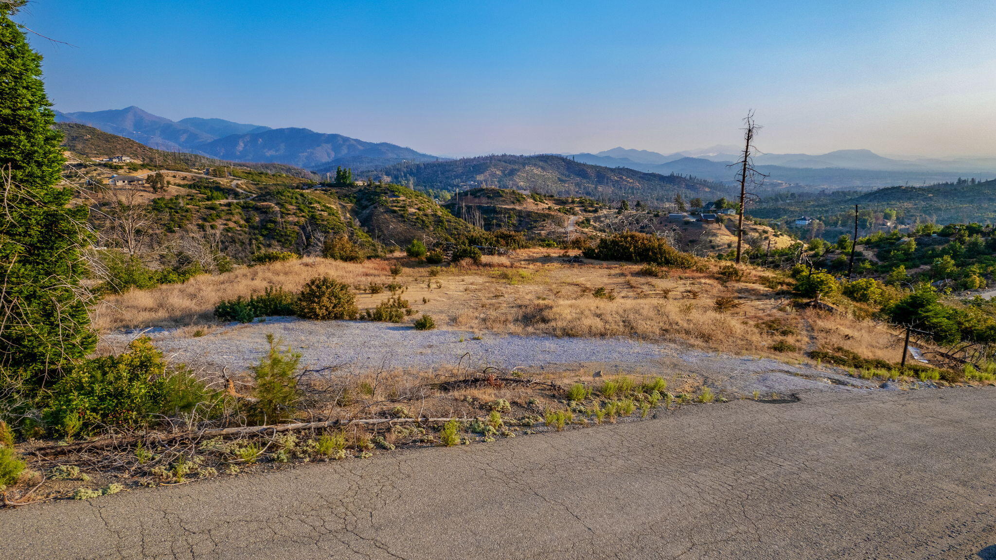 15346 Blackbart Road Shasta, CA 96087 - Photo 7 of 24 a view of a house with a mountain and a forest