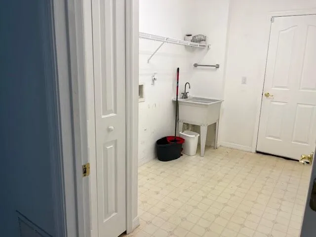 a view of an empty room and window