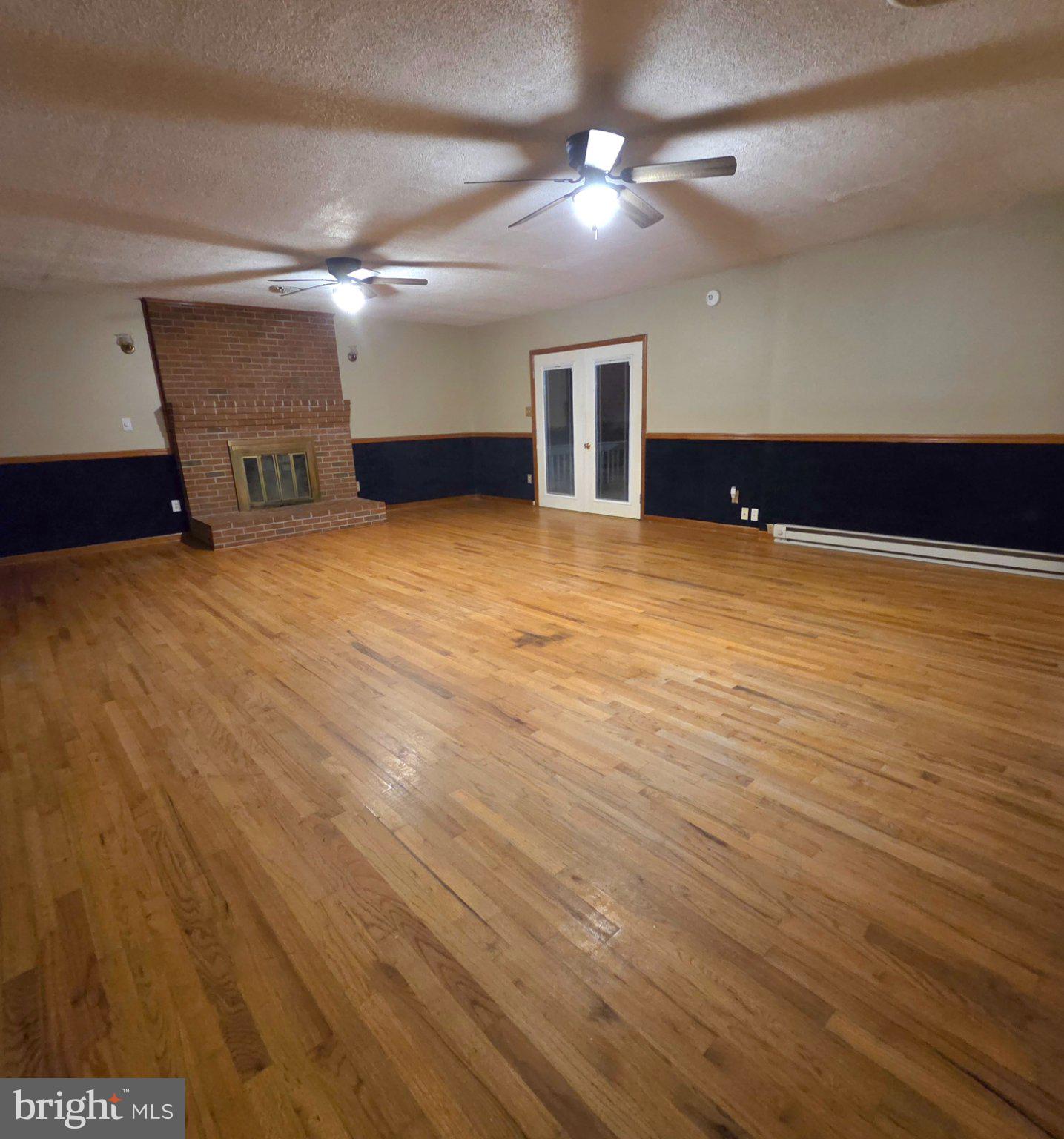 178 Payne Road Winchester, VA 22603 - Photo 59 of 101 20x26 family rm/ french drs to lg front deck!
