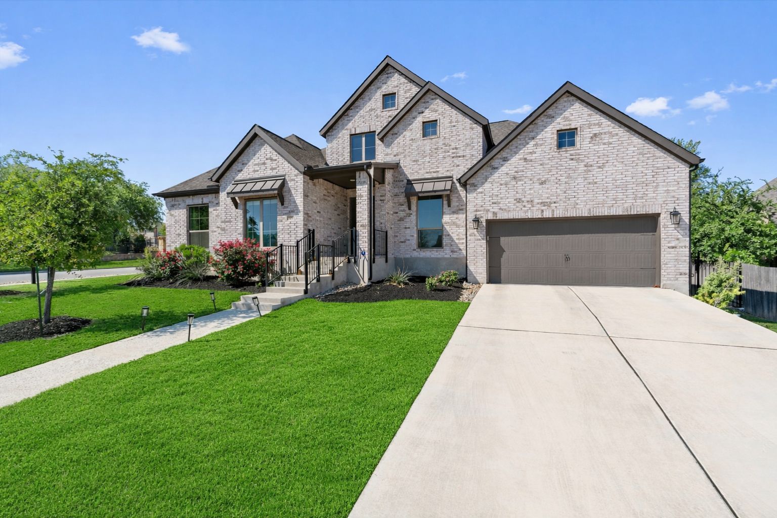 101 Pienza Drive Georgetown, TX 78628 - Photo 9 of 40 a front view of a house with a yard and trees