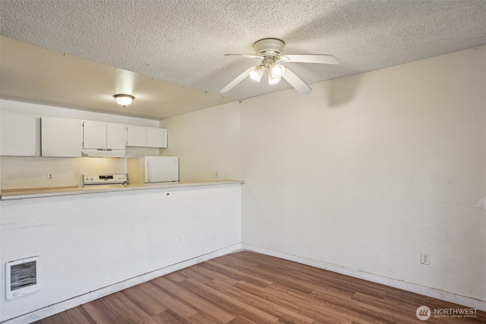 31003 14th Avenue South, Unit H8 Federal Way, WA 98003 - Photo 8 of 17 a view of kitchen with wooden floor