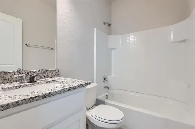 a view of a room with shelf on the wall