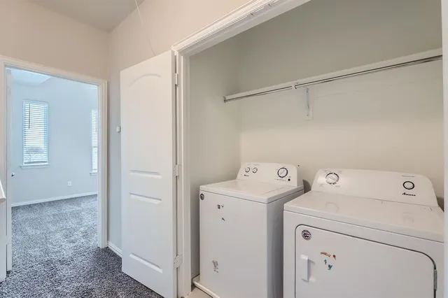 a front view of a house with garage