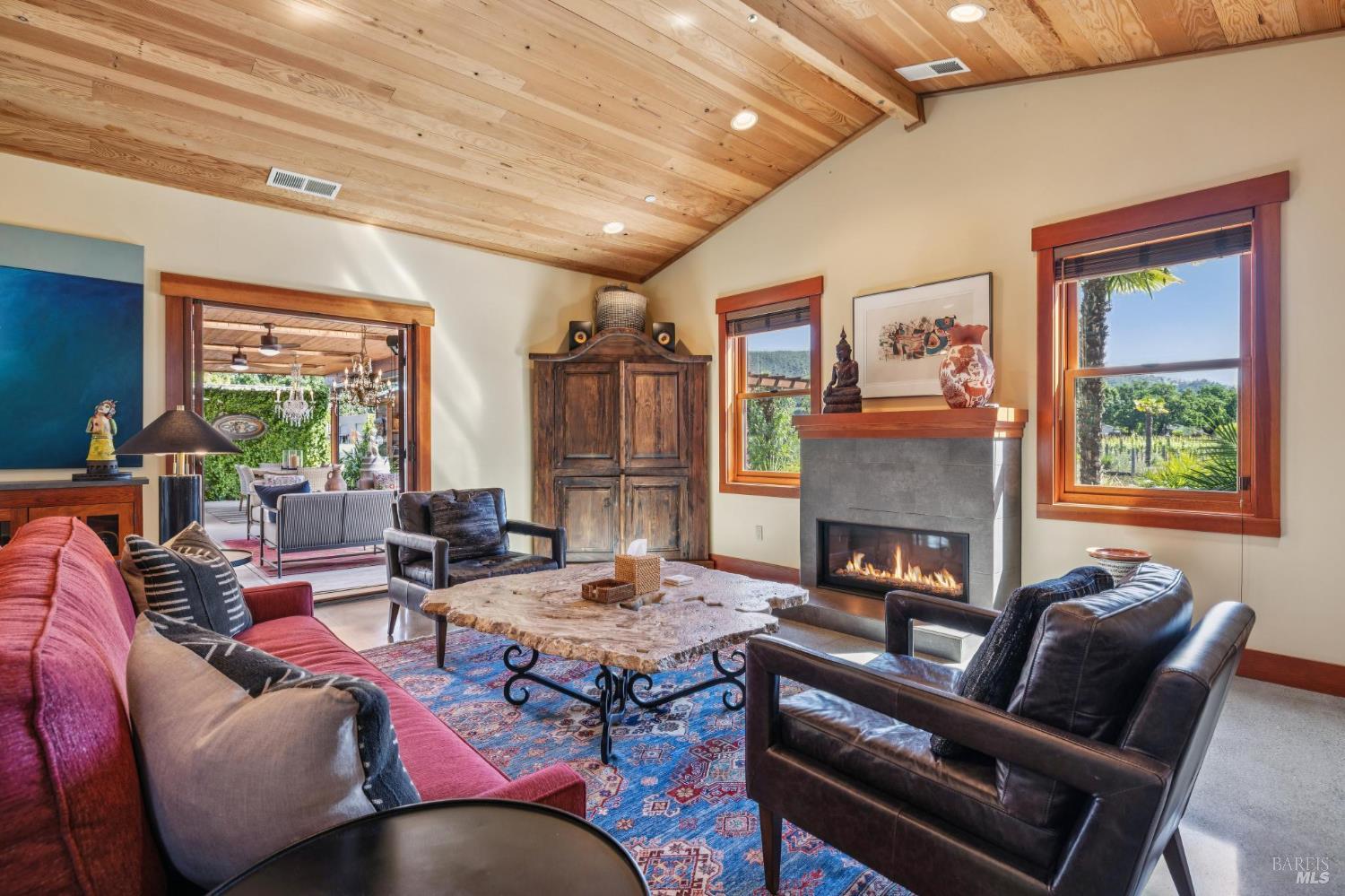 21117 Burndale Road Sonoma, CA 95476 - Photo 13 of 48 a living room with furniture and a fireplace