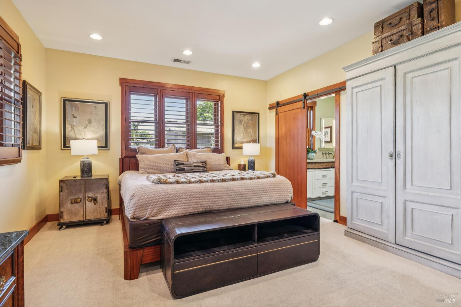 21117 Burndale Road Sonoma, CA 95476 - Photo 17 of 48 a bedroom with a bed and a dresser