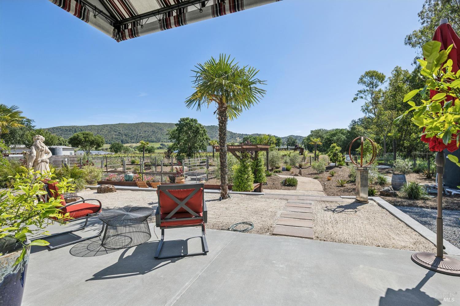 21117 Burndale Road Sonoma, CA 95476 - Photo 24 of 48 a view of a terrace with sitting area