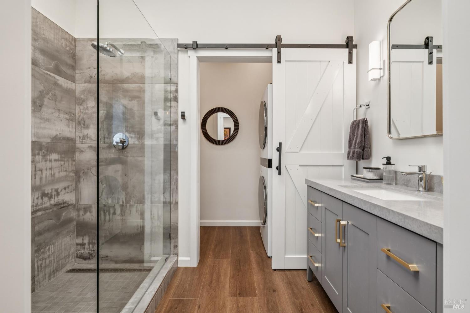 21117 Burndale Road Sonoma, CA 95476 - Photo 31 of 48 a bathroom with a shower sink and mirror