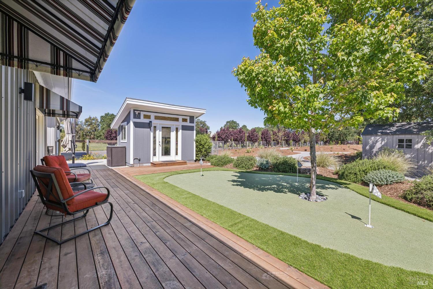 21117 Burndale Road Sonoma, CA 95476 - Photo 32 of 48 a view of a house with backyard and sitting area