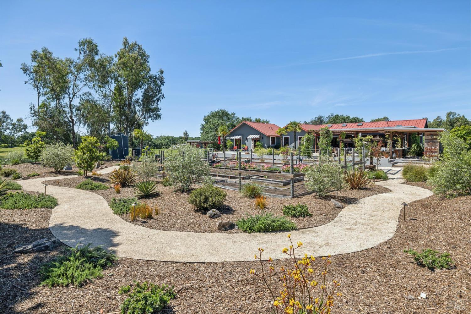 21117 Burndale Road Sonoma, CA 95476 - Photo 38 of 48 a view of a swimming pool with a patio
