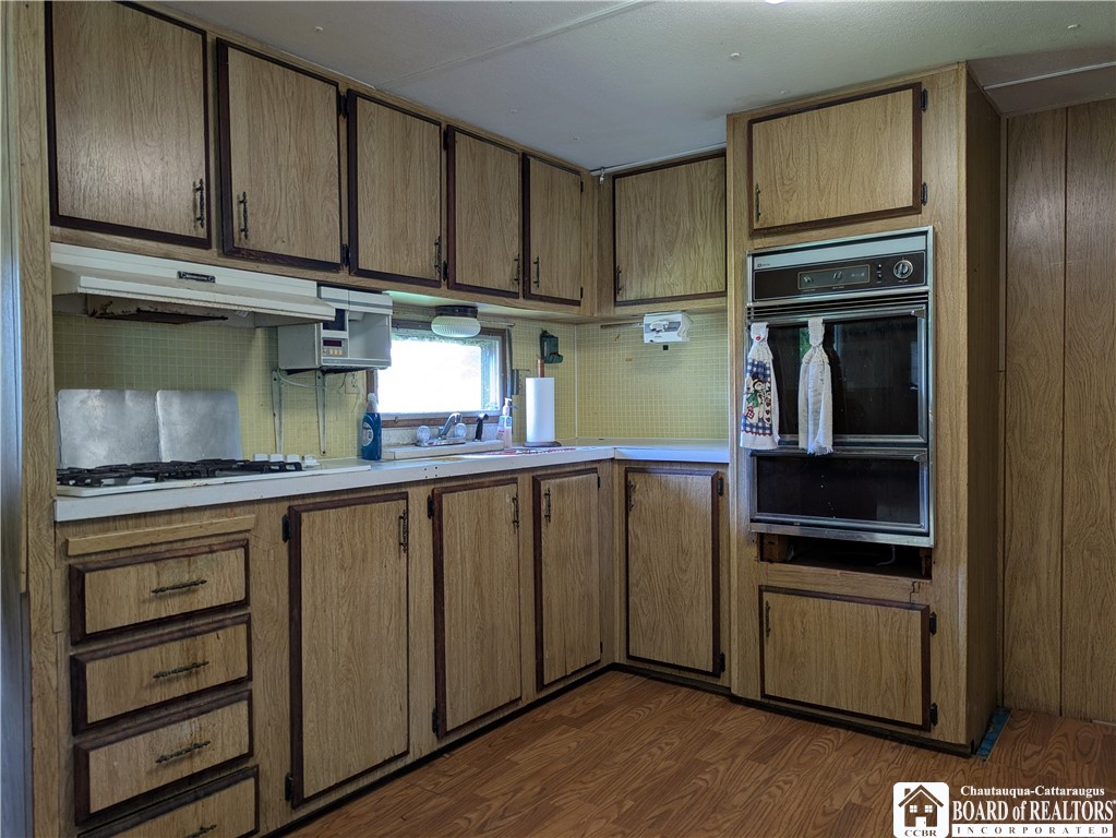 6 Burton Avenue Ripley, NY 14775 - Photo 7 of 25 Kitchen with a cooktop and oven