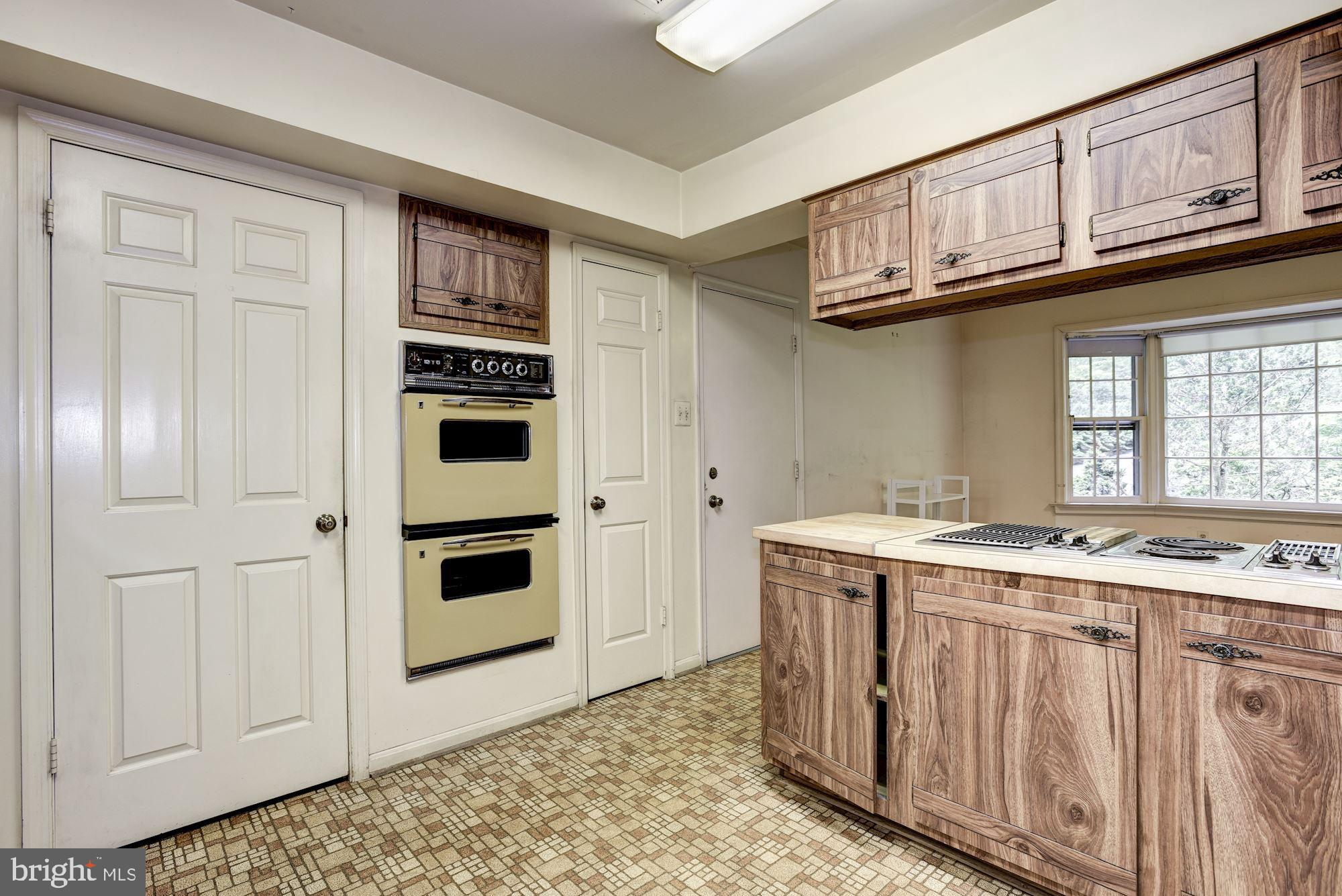 10715 Midsummer Drive Reston, VA 20191 - Photo 12 of 43 Kitchen Entry into Mudroom & Garage